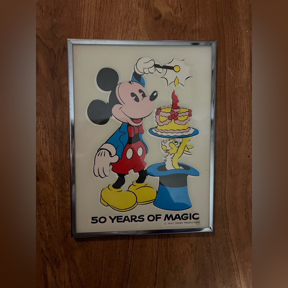 Vintage Brytone New York framed 50 years of Walt Disney. Frame size is 9x11.